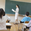 Elementary school students attend classes from behind