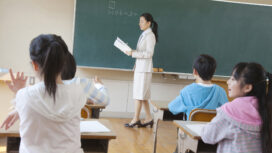 Elementary school students attend classes from behind