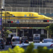 Shinkansen high-speed test trains or known as Doctor Yellow, travels along an overpass in the middle of downtown Monday, Feb. 6, 2023, in Tokyo. The special trains primarily monitor the high-speed rail network's condition. (AP Photo/Eugene Hoshiko)