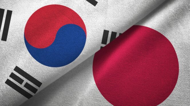 
					Japan and South Korea flag together realtions textile cloth fabric texture