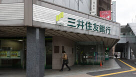 Fukuoka, Japan - March 14, 2013 : Pedestrian walk past Sumitomo Mitsui Banking Corporation located in Hakata, Fukuoka Prefecture, Japan. Sumitomo Mitsui Financial Group is Japan's second-biggest bank by market value.