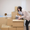 Mother and child preparing for moving house
