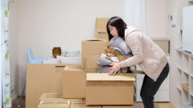Mother and child preparing for moving house