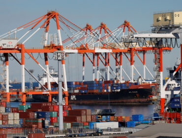 Containers are seen at an industrial port in Yokohama, Japan, January 16, 2017.    REUTERS/Kim Kyung-Hoon