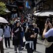 Tourists walk along a street in Kyoto, Japan, on Saturday, April 13, 2024. The yen dropped to a three-decade low against the dollar this week on prospects that despite the BOJs policy shift, yield differentials will remain wide between Japan and the US. Photographer: Buddhika Weerasinghe/Bloomberg
