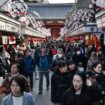 People walk along the main shopping street at Sensoji Temple in the popular tourist destination of Asakusa in central Tokyo on February 21, 2025. Japanese inflation accelerated in January, further pressuring households as prices excluding fresh food rose 3.2 percent on-year, government data showed on February 21. Overall, inflation including volatile fresh food was up 4.0 percent on-year -- among the highest in the G7 -- speeding up from 3.6 percent in December and 2.9 percent in November. (Photo by Richard A. Brooks / AFP)