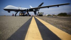 A General Atomics MQ-9 Reaper stands on the runway during 