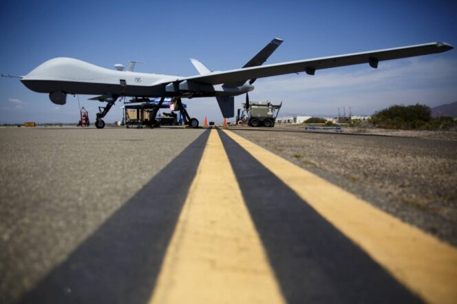 
					A General Atomics MQ-9 Reaper stands on the runway during 