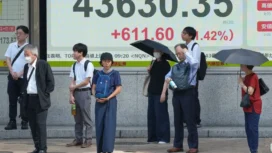 (AP Photo/Eugene Hoshiko)