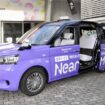 A taxi from ride hailing and sharing firm NearMe Inc. is displayed in Tokyo on Oct. 28, 2025. (Kyodo)