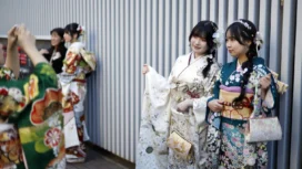 Kimono-clad Japanese young women take pictures after attending a Coming-of-Age Day ceremony in Yokohama, near Tokyo, Japan, 12 January 2026. EPA/FRANCK ROBICHON