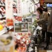 Shoppers browse vegetables at a supermarket in Chiba, east of Tokyo February 26, 2014. When it comes to trade policy, Prime Minister Shinzo Abe faces a choice between the fears of Japan's ageing farm lobby and the hopes of suburban families lined up here - a nearly 20-meter long meat counter at a Tokyo mall showcasing Australian beef. Picture taken February 26, 2014. REUTERS/Yuya Shino (JAPAN - Tags: BUSINESS POLITICS AGRICULTURE FOOD)