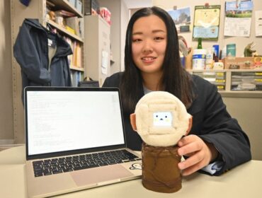 Oita University Graduate School student Miyu Fujisawa shows off the 