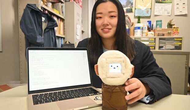 Oita University Graduate School student Miyu Fujisawa shows off the 