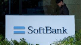 The logo of Japanese company SoftBank Group is seen outside the company's headquarters in Tokyo on January 22, 2025. Shares in Japanese tech behemoth SoftBank Group soared more than eight percent on Janaury 22 after US President Donald Trump announced a major investment to build AI infrastructure. (Photo by Kazuhiro NOGI / AFP)