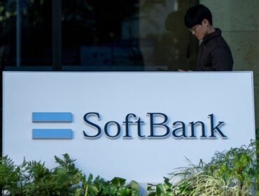 The logo of Japanese company SoftBank Group is seen outside the company's headquarters in Tokyo on January 22, 2025. Shares in Japanese tech behemoth SoftBank Group soared more than eight percent on Janaury 22 after US President Donald Trump announced a major investment to build AI infrastructure. (Photo by Kazuhiro NOGI / AFP)