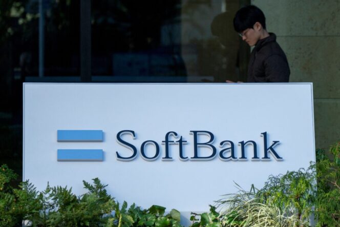 
					The logo of Japanese company SoftBank Group is seen outside the company's headquarters in Tokyo on January 22, 2025. Shares in Japanese tech behemoth SoftBank Group soared more than eight percent on Janaury 22 after US President Donald Trump announced a major investment to build AI infrastructure. (Photo by Kazuhiro NOGI / AFP)