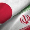 Iran and Japan flag together realtions textile cloth fabric texture