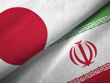 Iran and Japan flag together realtions textile cloth fabric texture