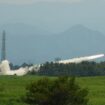 U.S. Marines conduct a live-fire training of the High Mobility Artillery Rocket System, short for HIMARS, at Camp Fuji, in Gotemba, southwest of Tokyo, Wednesday, May 20, 2026. (AP Photo/Hiro Komae)