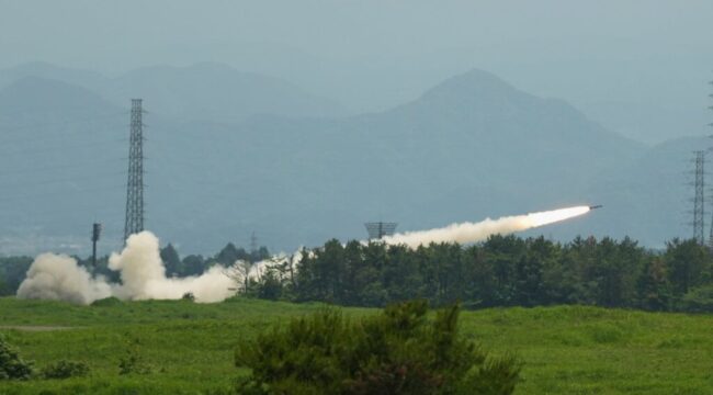 U.S. Marines conduct a live-fire training of the High Mobility Artillery Rocket System, short for HIMARS, at Camp Fuji, in Gotemba, southwest of Tokyo, Wednesday, May 20, 2026. (AP Photo/Hiro Komae)