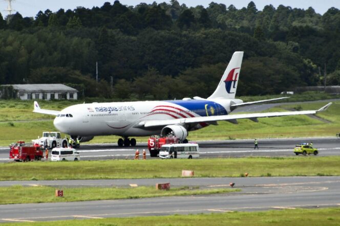 
					Pesawat Malaysia Airlines Keluarkan Asap Hitam di Narita, Lepas Landas Dibatalkan