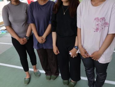 Photo taken on July 30 shows Indonesian technical interns including Davina Putri (1st from L) who are living in an evacuation shelter in Hikawa in Kumamoto Prefecture with their faces not pictured at their request.  Image: Kyodo
