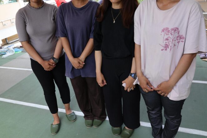 
					Photo taken on July 30 shows Indonesian technical interns including Davina Putri (1st from L) who are living in an evacuation shelter in Hikawa in Kumamoto Prefecture with their faces not pictured at their request.  Image: Kyodo