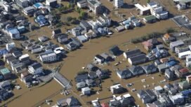 Photo shows a flooded residential area in Sakura in Chiba Prefecture on Tuesday. Image: Kyodo