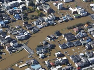 Photo shows a flooded residential area in Sakura in Chiba Prefecture on Tuesday.  Image: Kyodo
