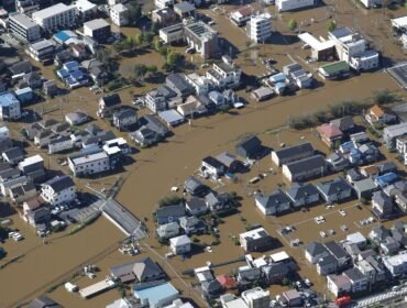 Photo shows a flooded residential area in Sakura in Chiba Prefecture on Tuesday.  Image: Kyodo
