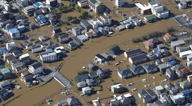 Photo shows a flooded residential area in Sakura in Chiba Prefecture on Tuesday.  Image: Kyodo
